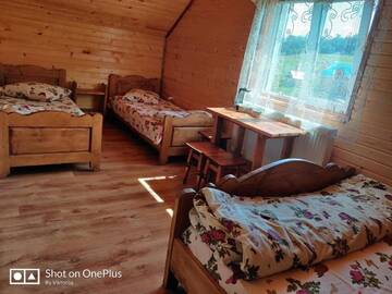Фото номера Четырехместный номер с душем Гостевой дом "У Яслигана" г. Пилипец 2